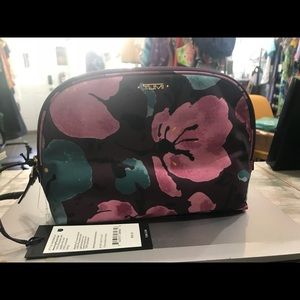 Tumi NWT Floral Neating Pouch Set Of 3. Aubergine